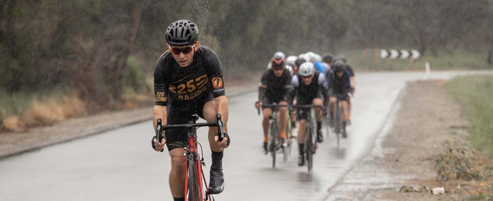 Riders in a race in the rain